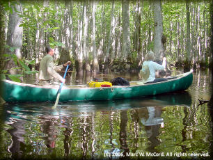 Larry Rice and Mara Kahn canoeing Bayou deView