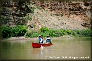 A canoes carries paddlers down the Green River